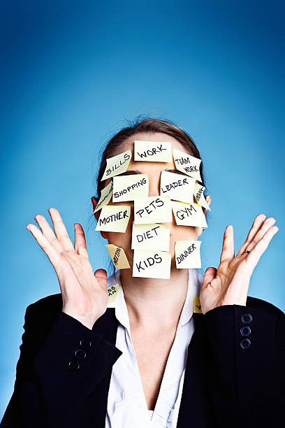 istock Overburdened woman covered in sticky note task reminders gives up! 177470617