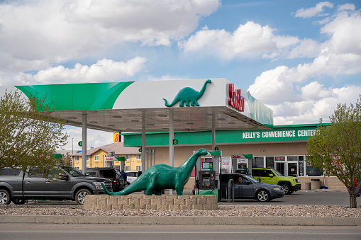 DINO, an apatosaurus or brontosaurus, mascot of Sinclair brand petroleum products, at a Sinclair gas station in Rock Springs, Wyoming, USA.