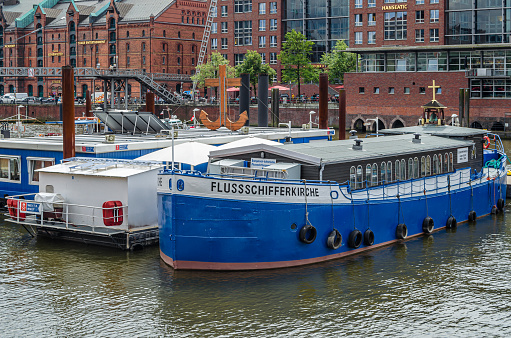 Hamburg, Germany - July 7, 2014: View of the Flussschifferkirche, a Protestant church in Hamburg that was built on a barge on Weser river in 1906