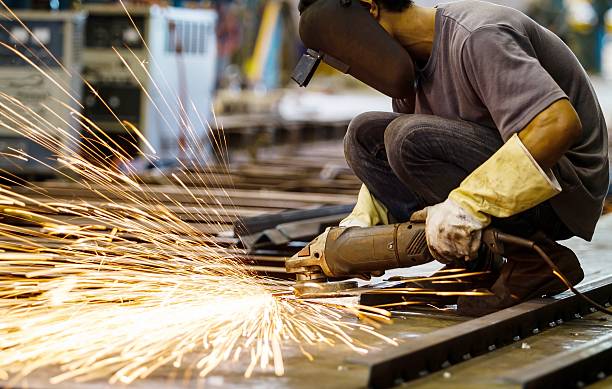 istock Electric wheel grinding on steel structure in factory 177477543