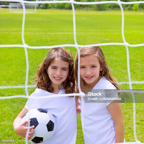 Soccer Football Kid Girls Playing On Field Stock Photo - Download Image Now - Girls, Soccer, Two People