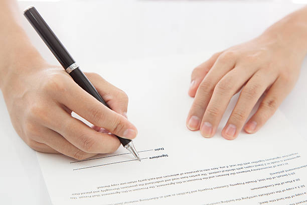 istock Female hand signing contract. 177478579