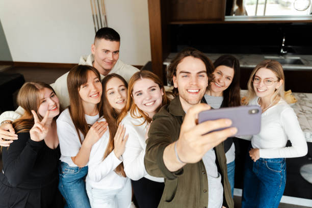 istock Young friends taking selfie while gathering at birthday celebration 1774798765