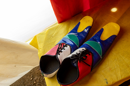 multicolored clown shoes backstage at a circus in the interior of Brazil