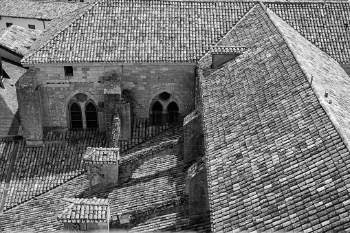 Valldemossa Charterhouse built in 14th century in the old town of  Valldemossa Village. Aerial Drone Detail View overlooking the old town of Valdemossa. Church Tower of Valldemossa Charterhouse in the Center. Valldemossa, Majorca Island, Balearic Islands, Catalonia, Spain