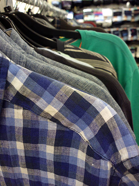Shirt. This image was taken with a mobile phone. colorful check shirts on sale at a clothing store stock pictures, royalty-free photos & images