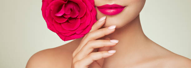 istock Beautiful young woman a rose flower 1774894880