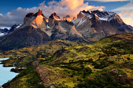 An early morning sunrise landscape photograph of the Cuernos del Paine, or \