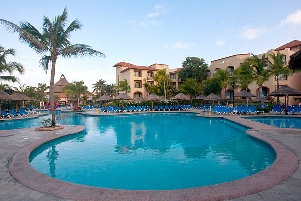 istock Beautiful pool and patio in tropical setting 177490186