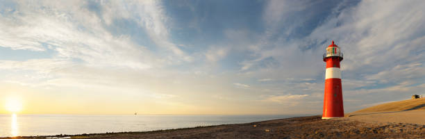 lighthouse - cloud cloudscape sea north sea stock-fotos und bilder