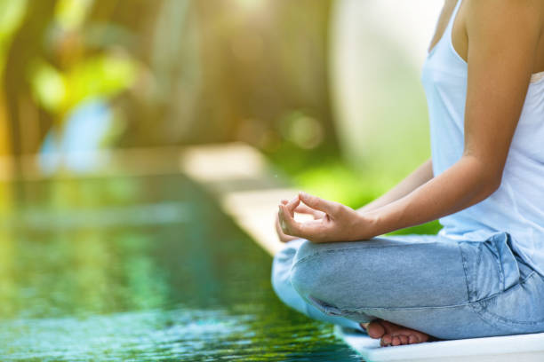istock Yoga meditation by the pool 1774908720
