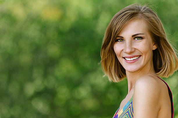 istock smiling beautiful young woman close up 177491099