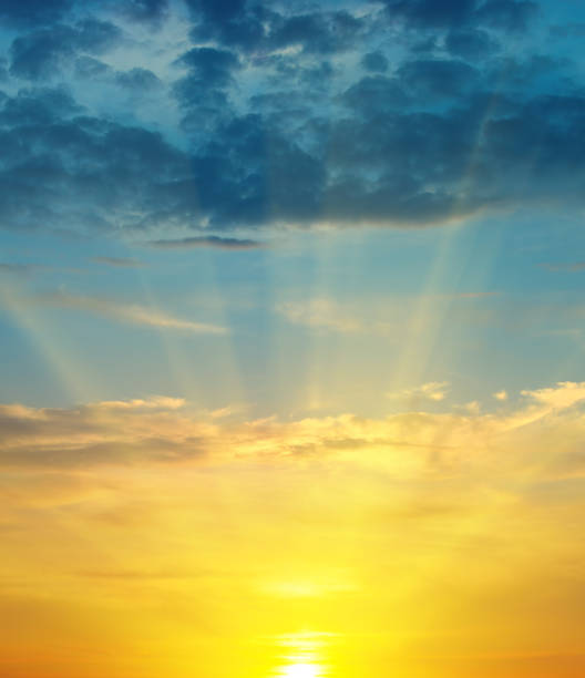 istock A sky with bright dawn. Vertical photo. 1774911425