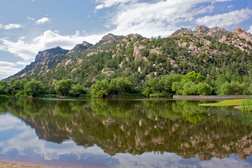 granite mountain outside prescott arizona is reflected in granite basin lake