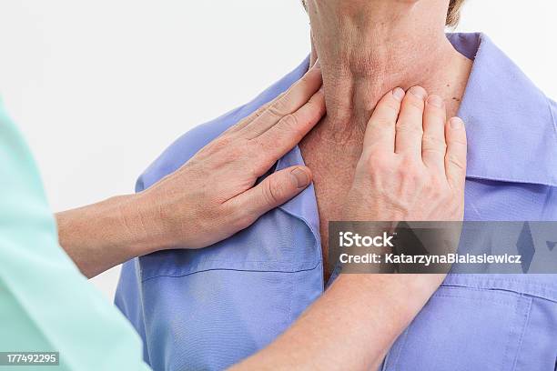 Thyroid Problems Stock Photo - Download Image Now - Thyroid Gland, Human Neck, Examining