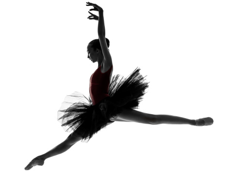 one caucasian young woman ballerina ballet dancer dancing with tutu in silhouette studio on white background