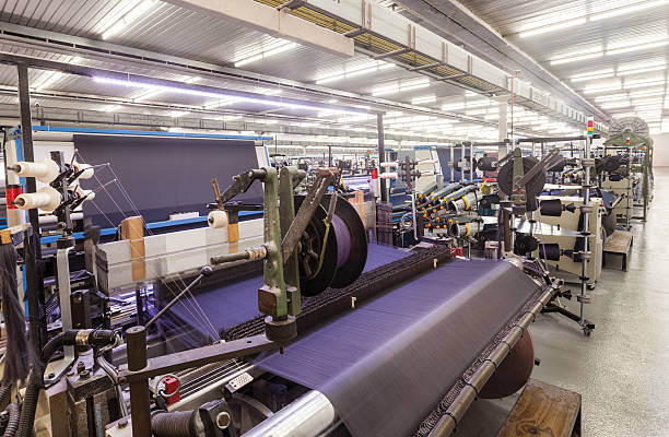 Textile Production - Weaving Textile Production - Weaving textile industry stock pictures, royalty-free photos & images