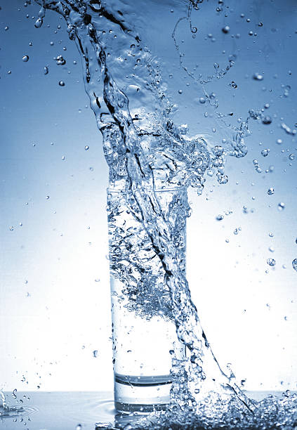 istock Water splash out of glass 177494447