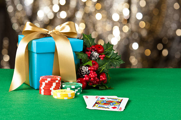 Ace and King in Christmas setting Ace and King in Christmas setting with poker chips christmas casino stock pictures, royalty-free photos & images