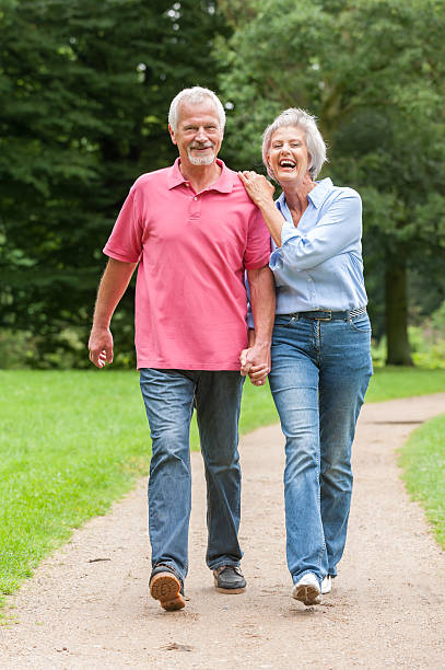 istock An older couple happily enjoying a stroll in the park 177495002