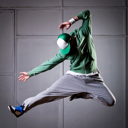 Urban hip hop dancer jumping in the air