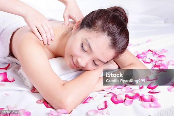 Woman Smile Getting Spa Treatment With Rose Stock Photo - Download Image Now - Beautiful People, Beautiful Woman, Japanese Ethnicity