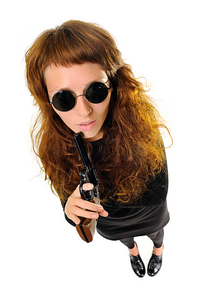 istock Woman with a gun 177495955
