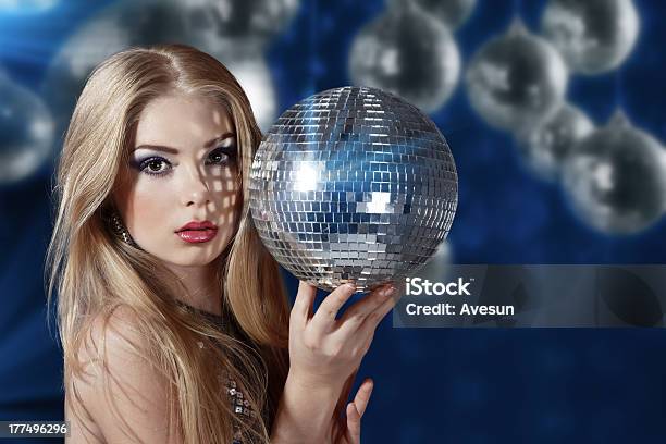 Young Woman Holding Disco Ball Stock Photo - Download Image Now - 20-29 Years, Adult, Adults Only