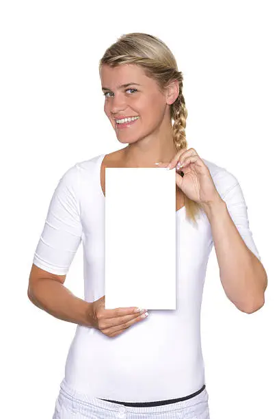 Blonde girl holds a sign