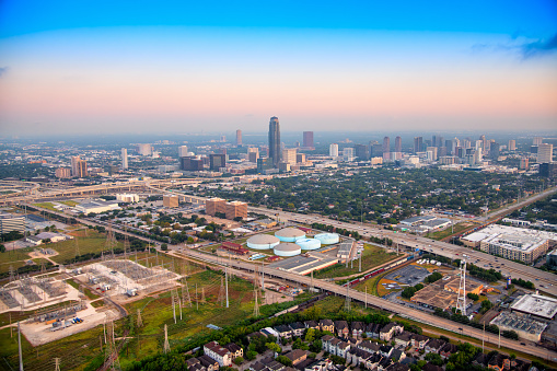 The Galleria section of Houston, Texas, also known as Houston's second downtown because of the separate and distinct skyline of the district including the landmark Williams Tower feature in the center of the image, shot from about 700 feet via helicopter at dawn.