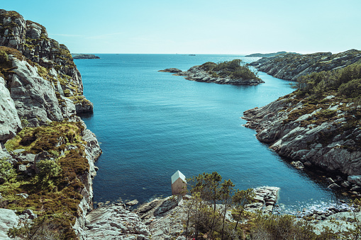 The coast of Finnish Porkkala in the evening of a summer day waves the stones of the island.