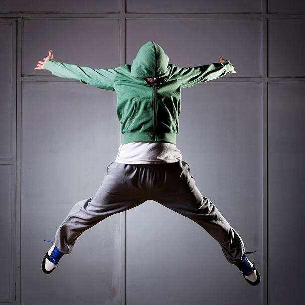 tancerz hip-hopu skoki - dancing dancer hip hop jumping zdjęcia i obrazy z banku zdjęć