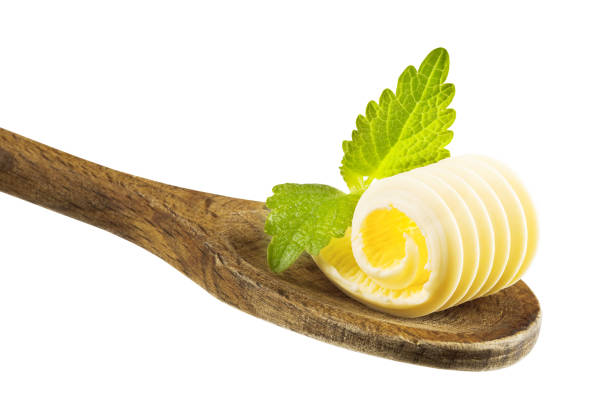 istock Butter curl on a wooden spoon 177498071