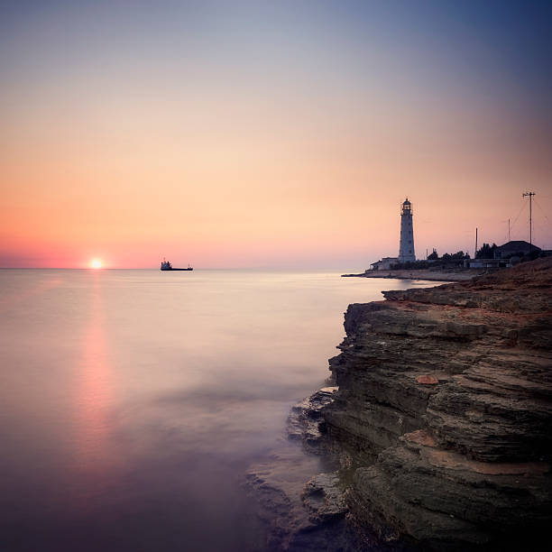 istock Lighthouse and submerged vessel 177498767
