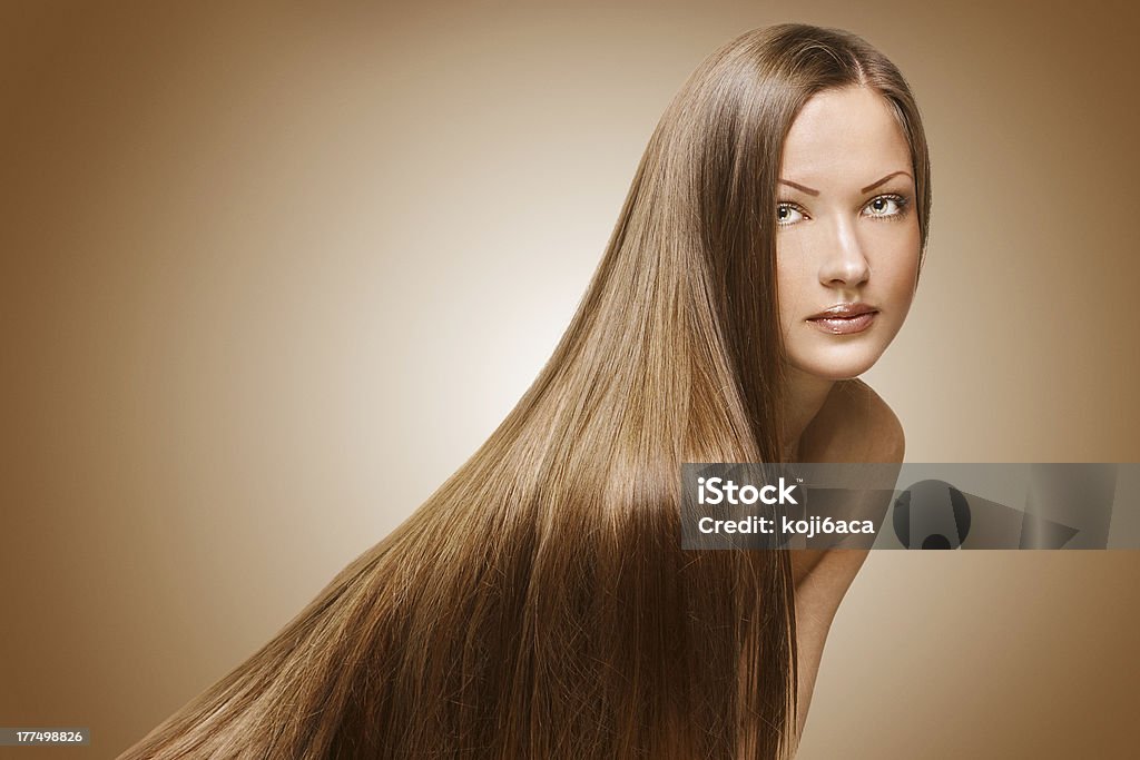 beautiful woman , with long hair "studio shot of a young fashion model , with long shiny hair" 20-29 Years Stock Photo