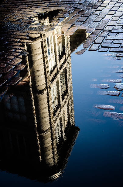 istock Cobblestone reflection of old building 177498881