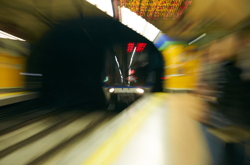 18-11-2012 Madrid, Spain - Dynamic image of a underground train exiting a tunnel with a captivating blur effect