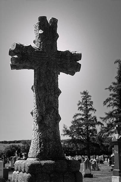 istock stone cross on a grave in the cemetery 177500312