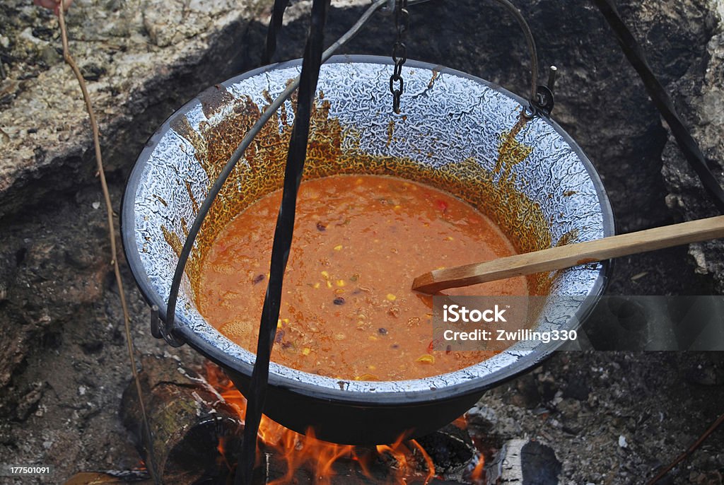 stew cooked on a campfire Campfire Stock Photo