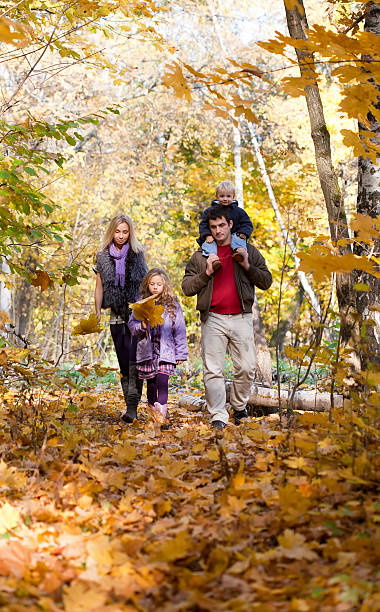 istock Family Enjoying Walk In Park 177502388