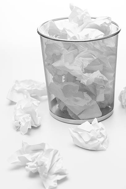 istock Office trash bin full of paper waste 177502897