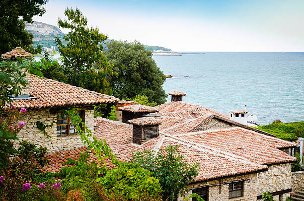 istock Roofs over sea shore 177502922
