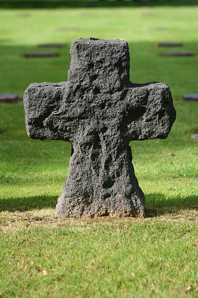 istock Stone Cross at War Cemetery 177503151