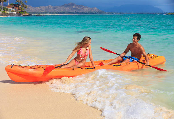 istock couple in their kayak at the beach 177503185