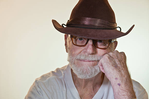 This senior male model is showing that he is bored.