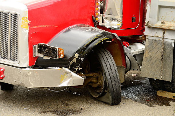 Semi truck accident wheel bent stock photo