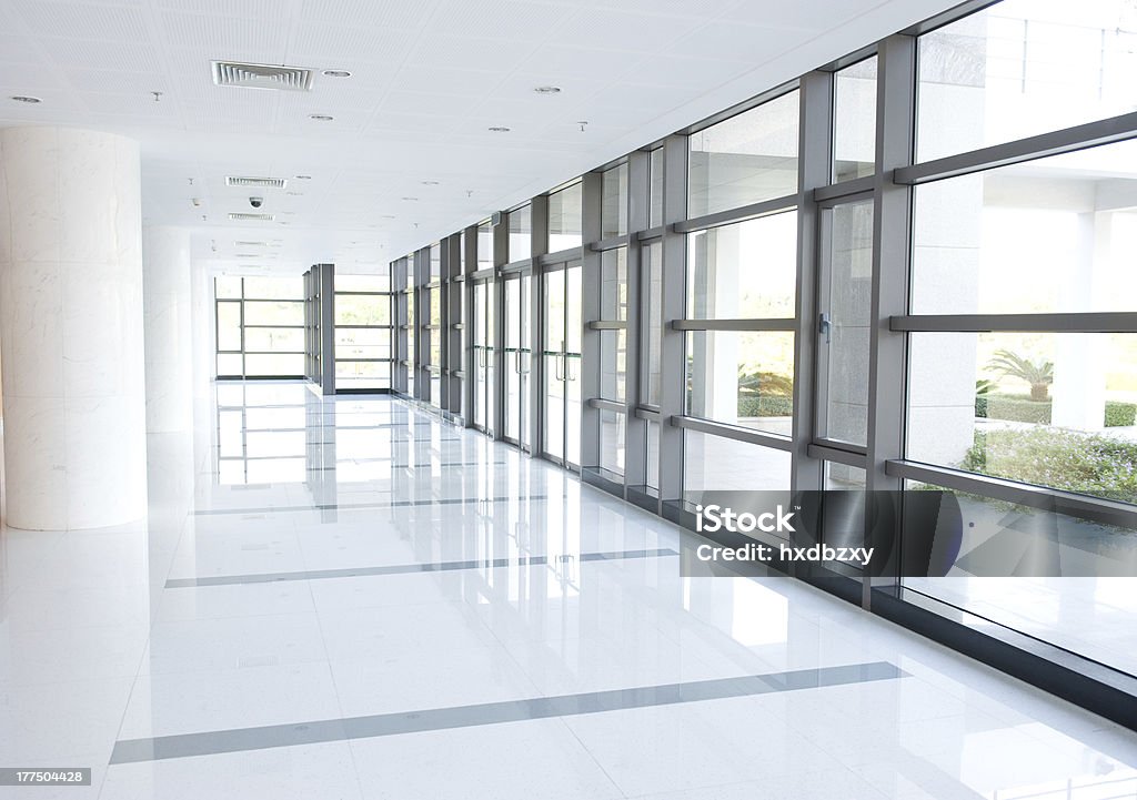 corridor of the office building empty long corridor in the modern office building. Architectural Column Stock Photo