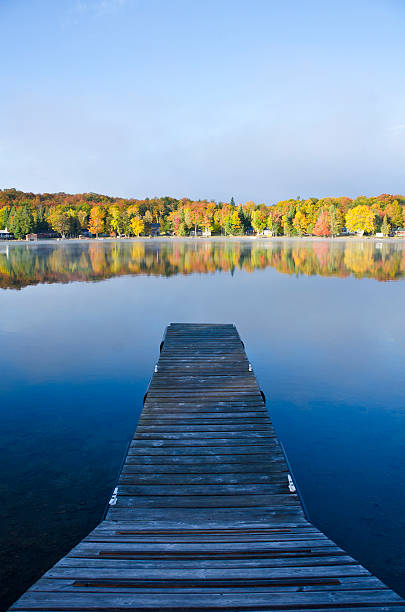 istock Docks on a Calm Lake Lined with Colorful Trees 177505156