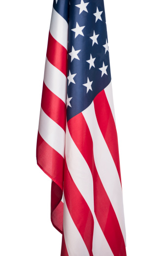 American flag shot by itself on white.