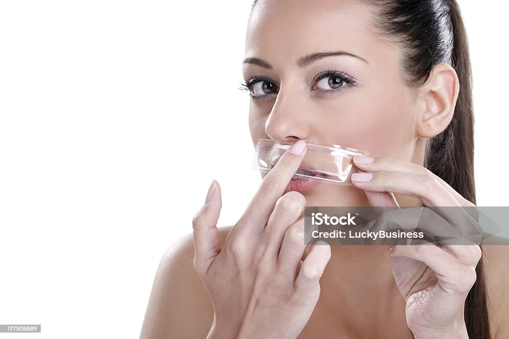 depilation of mustache Beautician depilating a woman with wax Human Face Stock Photo